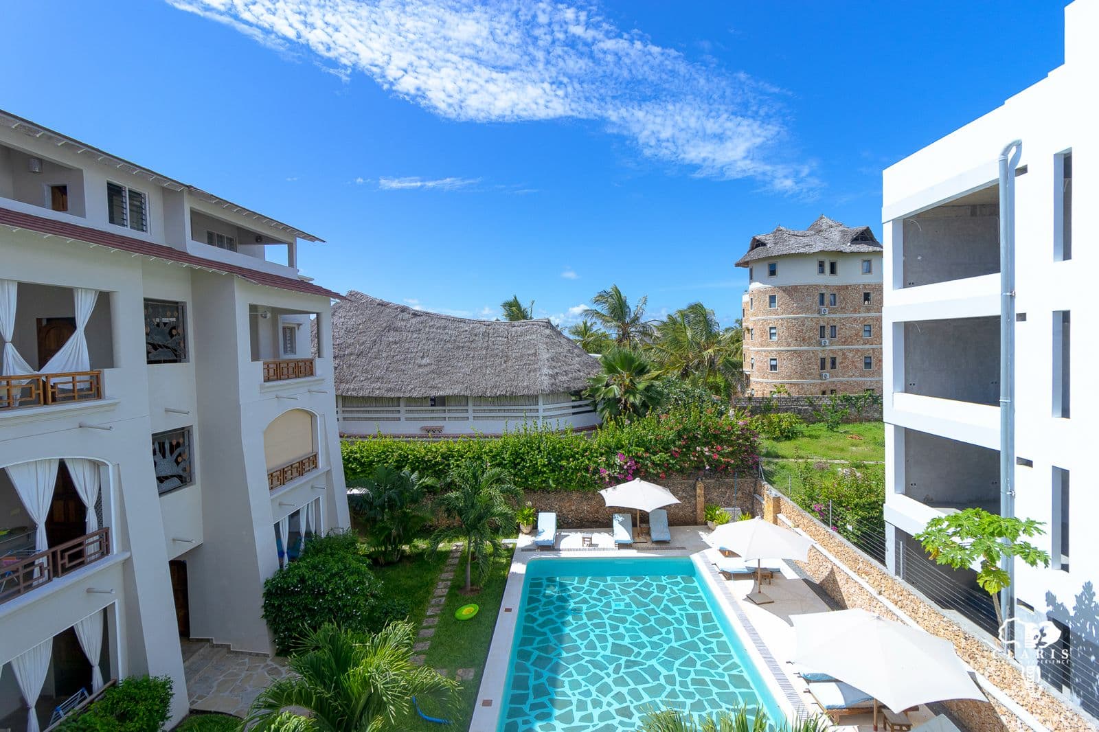 A coastal apartment development with a pool in Kenya
