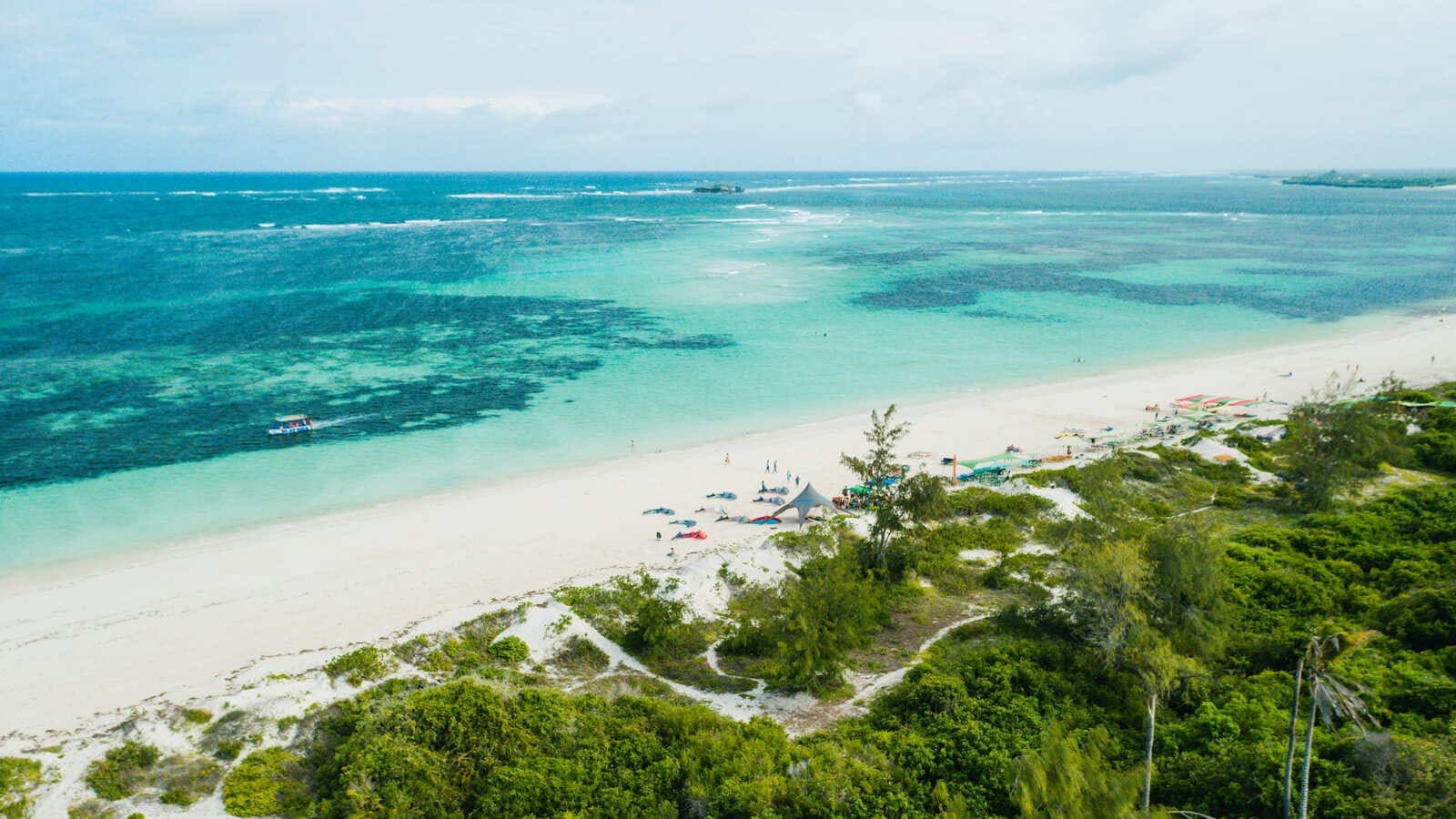 Jacaranda Bay Watamu aerial view of turquoise reef and white sand beach